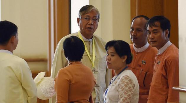 Htin Kyaw (Centre), trusted confidante and anointed proxy of Myanmar democracy icon Aung San Suu Kyi/AFP