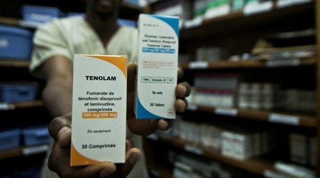  A man holds anti-retroviral drugs at the Medecins Sans Frontieres pharmacy in the town of Lingala, India/AFP-File