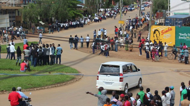 People gather in Beni, in the North Kivu province of eastern Democratic Republic of Congo, after five people were killed in an attack blamed on Ugandan rebels near the town on May 12, 2015/FILE