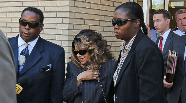 Tyka Nelson, the sister of Prince, and her attorneys exit the Carver County court house after the first hearing on the musician's estate on May 2, 2016 in Chaska, Minnesota/AFP