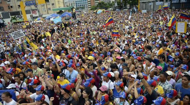 The IMF says bribery amounts to about 2% of global economic output, including in Venezuela where these protestors rally against corruption/AFP/GETTY