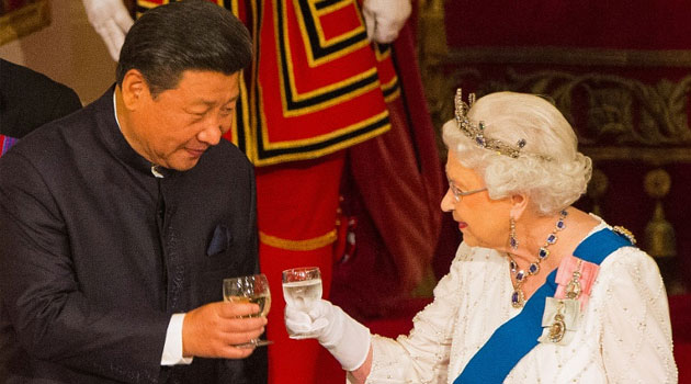 Britain's Queen Elizabeth II hosted a State Banquet for Chinese President Xi Jinping at Buckingham Palace in 2015/AFP