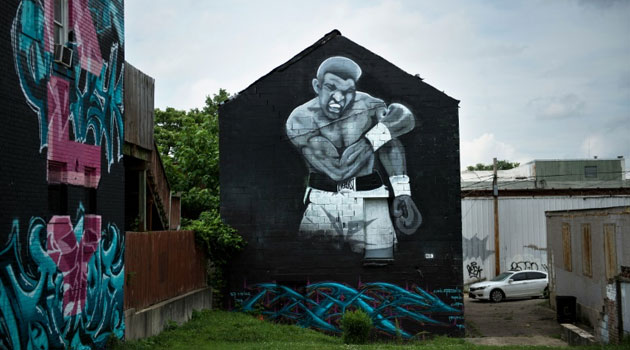 A mural with the image of boxing legend Muhammad Ali is seen in his native Louisville, Kentucky, where he was born in 1942/AFP