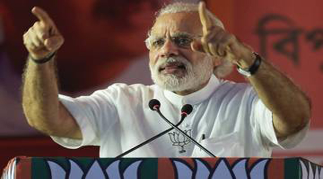 Indian Prime Minister Narendra Modi gestures as he address a public meeting ahead of the legislative assembly election in Kolkata/AFP 