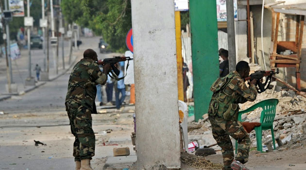 Somali security forces intervene after a car bomb attack claimed by Al-Qaeda-affiliated Shabaab militants, exploded and killed at least 5 people, on the Naasa Hablood hotel in Mogadishu on June 25, 2016/AFP