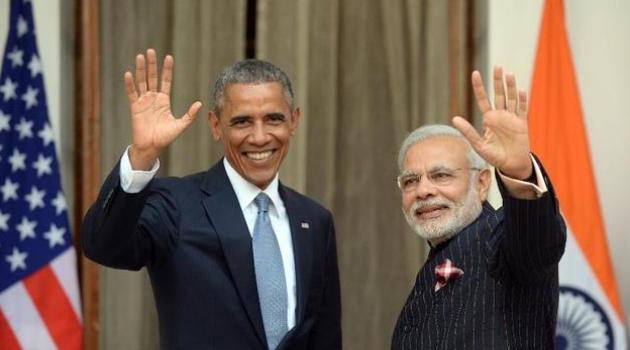 ndian Prime Minister Narendra Modi and US President Barack Obama wave prior to a meeting in New Delhi, on January,2015/AFP