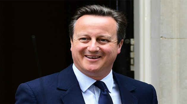 British Prime Minister David Cameron reacts as he departs 10 Downing Street enroute to the Houses of Parliament in central London on June 27/AFP