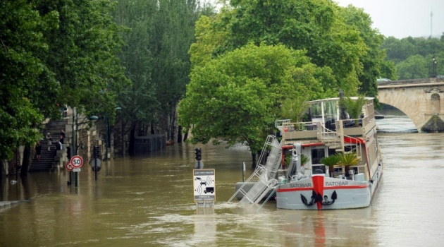 Parisians have urged to avoid the banks of River Seine which is expected to reach a peak of six metres/AFP