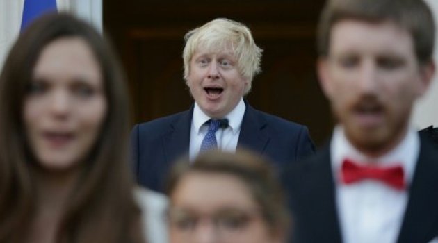 British Foreign Secretary Boris Johnson sings the French national Anthem during a reception at the French Ambassador's residence in west London, on July 14, 2016/AFP-File