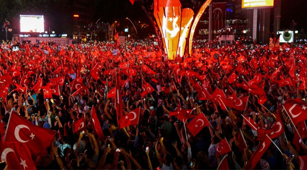 Pro-Erdogan supporters rally in Ankara's Kizilay square on July 18, 2016 during a demonstration in support to the Turkish government following a failed coup attempt/AFP