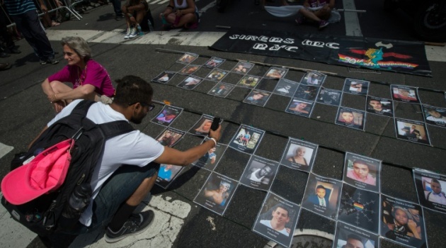 The latest shooting comes just six weeks after an attack on a gay nightclub in Orlando left 49 dead - some of the victims pictured here in a tribute at a Gay Pride parade in New York © AFP/File / Bryan R. Smith