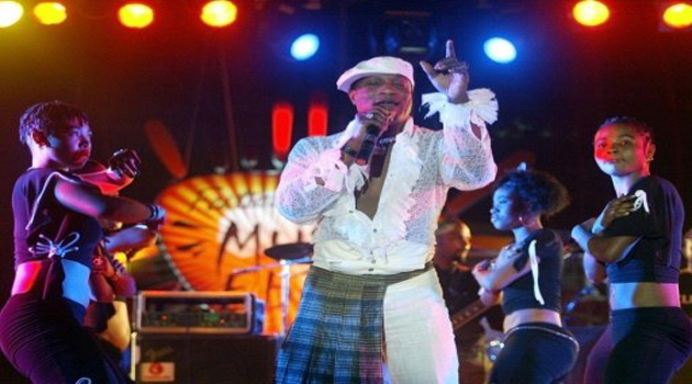 Koffi Olomide was thrown out of Kenya after being filmed the day before, kicking out and lunging at one of his dancers/AFP-File