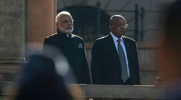 Indian Prime Minister Narendra Modi (left) and South African President Jacob Zuma attend a guard of honour at the Union Buildings in Pretoria, on July 8, 2016/AFP