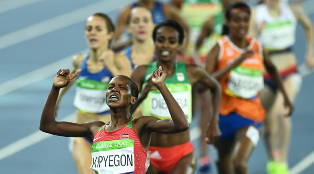 Kenya's Faith Chepngetich Kipyegon crossed the finish line to win the Women's 1500m Final in 4min 08.92sec after her burst over the last 250 metres/AFP