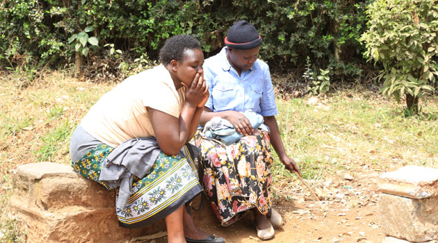 Women from different parts of Nairobi converge and sit on stones (mawe) waiting for household day jobs/FRANCIS MBATHA