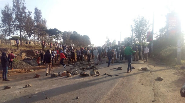 The students have closed a section of Magadi Road and lit bonfires  paralysing transport to and from Rongai/COURTESY