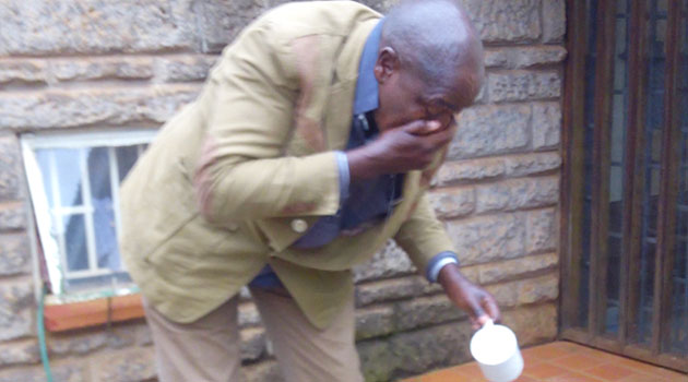 One of the MCAs washes his face after spending the night at the County Assembly/CFM NEWS