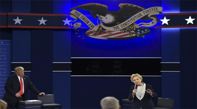 Presidential candidates Donald Trump and Hillary Clinton take part in the second presidential debate at Washington University in St.Louis, Missouri/AFP