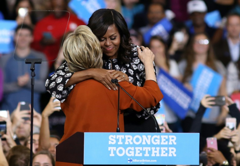 US First Lady Michelle Obama earned thunderous roars of approval from a crowd of 11,000 as she took the stage with Hillary Clinton in Winston-Salem, North Carolina