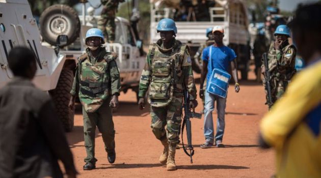 Soldiers from MINUSCA (UN Mission in the Central African Republic) patrol in Bangui on December 10, 2015/AFP