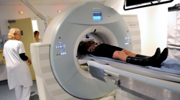 This file photo taken on February 06, 2013 shows a patient undergoing a scan, at the Oscar Lambret Center in Lille, northern France, a regional medical unit specialised in cancer's treatment/AFP