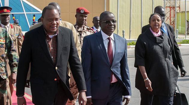 President Kenyatta during a stopover in Chad/PSCU