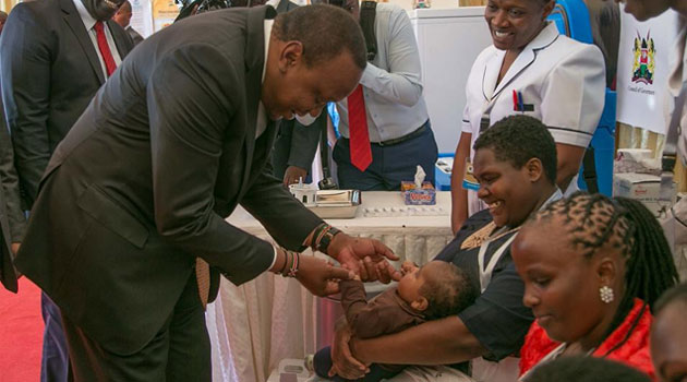 Image result for Uhuru during the launch of UHC program in kisumu