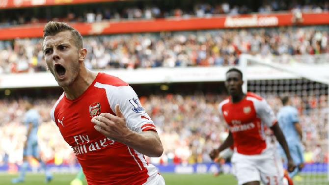 Jacl Wilshere celebrates scoring against Manchester City at The Emirates last season. PHOTO/File