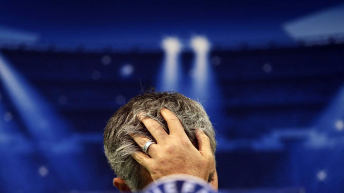Under pressure Chelsea manager, Jose Mourinho, bows his head at a press conference. PHOTO/File