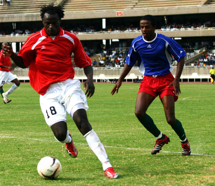 Former captain and record scorer, Dennis Oliech (left) in action against Eritrea. There's no space for him in the current squad.