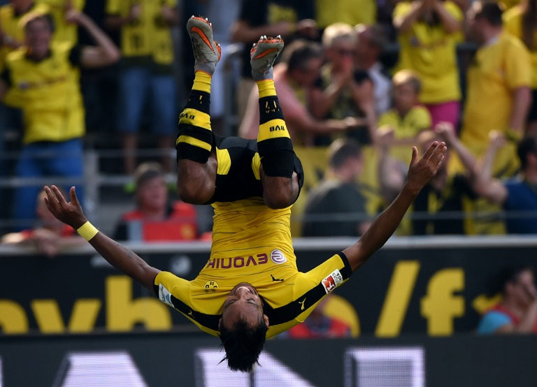 Dortmund's striker Pierre-Emerick Aubameyang flips after scoring during against Hertha Berlin in Dortmund, Germany, on August 30, 2015. PHOTO/AFP