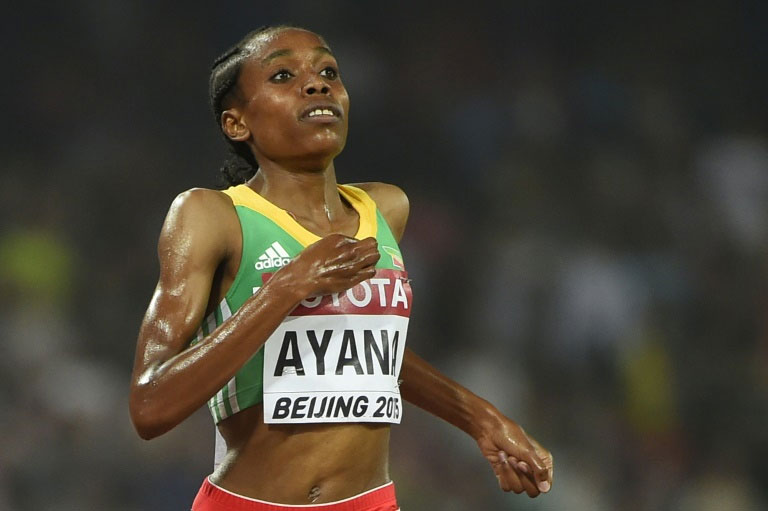 Ethiopia's Almaz Ayana competes in the final of the women's 5000 metres athletics event at the 2015 IAAF World Championships at the "Bird's Nest" National Stadium in Beijing on August 30, 2015. PHOTO/AFP