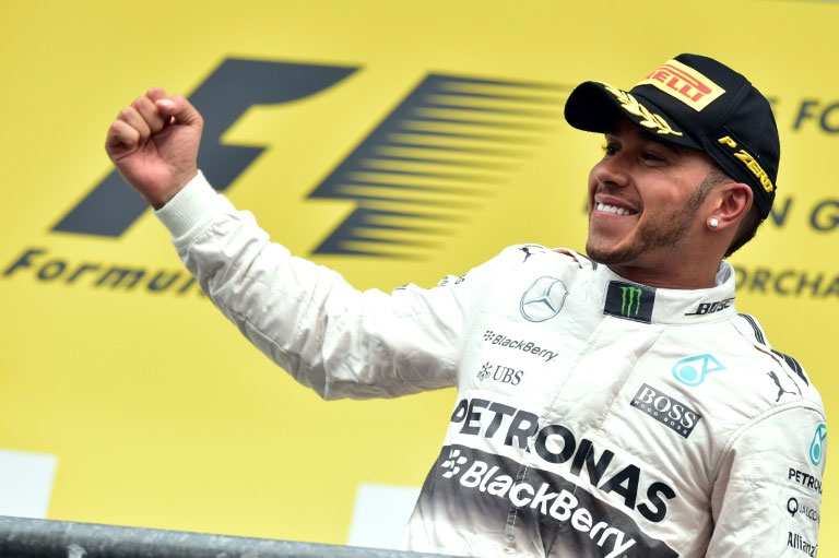 Lewis Hamilton celebrates victory in the Belgian Grand Prix. PHOTO/AFP