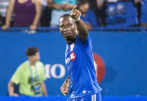 Montreal Impact's Didier Drogba reacts after scoring against the Chicago Fire during second half of a MLS soccer game in Montreal, Saturday, Sept. 5, 2015. PHOTO/MLS