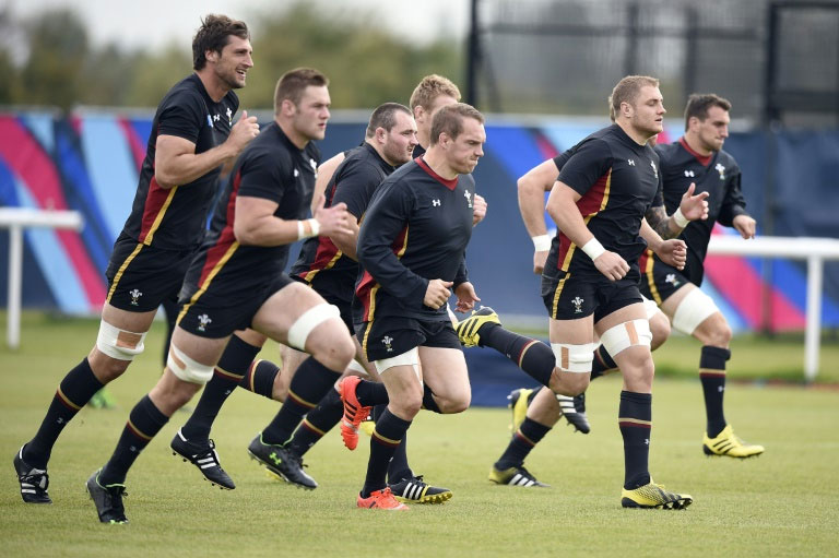 Wales' players take part in a team training session in southwest of London on October 15, 2015, two days prior to their 2015 Rugby Union World Cup quarter-final match against South Africa. PHOTO/AFP