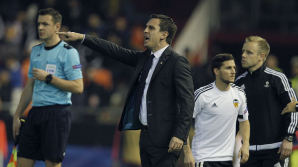 Valencia boss and former Manchester United captain Gary Neville shouts instruction from the technical area during their Champions League clash against Lyon on December 9, 2015. PHOTO/AFP