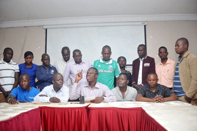 Hezron Okoth (centre) addressing the press flanked by 14 other branch chairmen. PHOTO/RAYMOND MAKHAYA