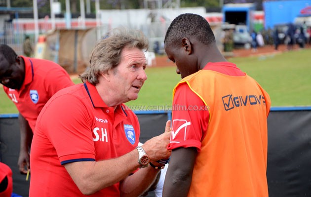 AFC Leopards coach Stewart Hall gives instructions to Cresten Mwanzo at half time. PHOTO/Timothy Olobulu