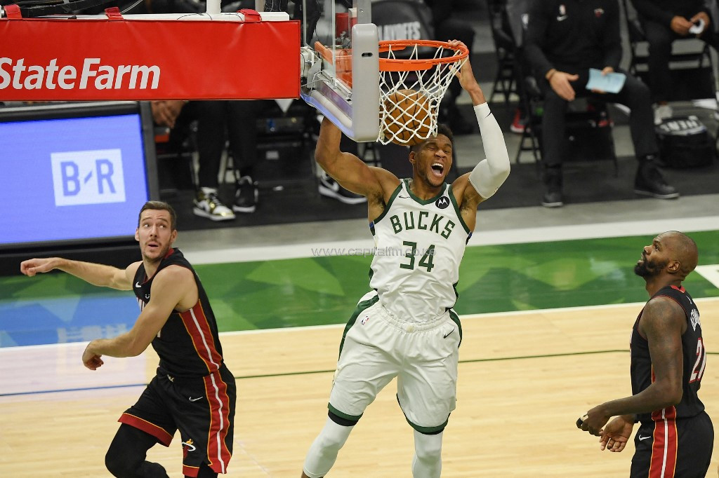 Bucks thrash Heat, Nuggets bounce back