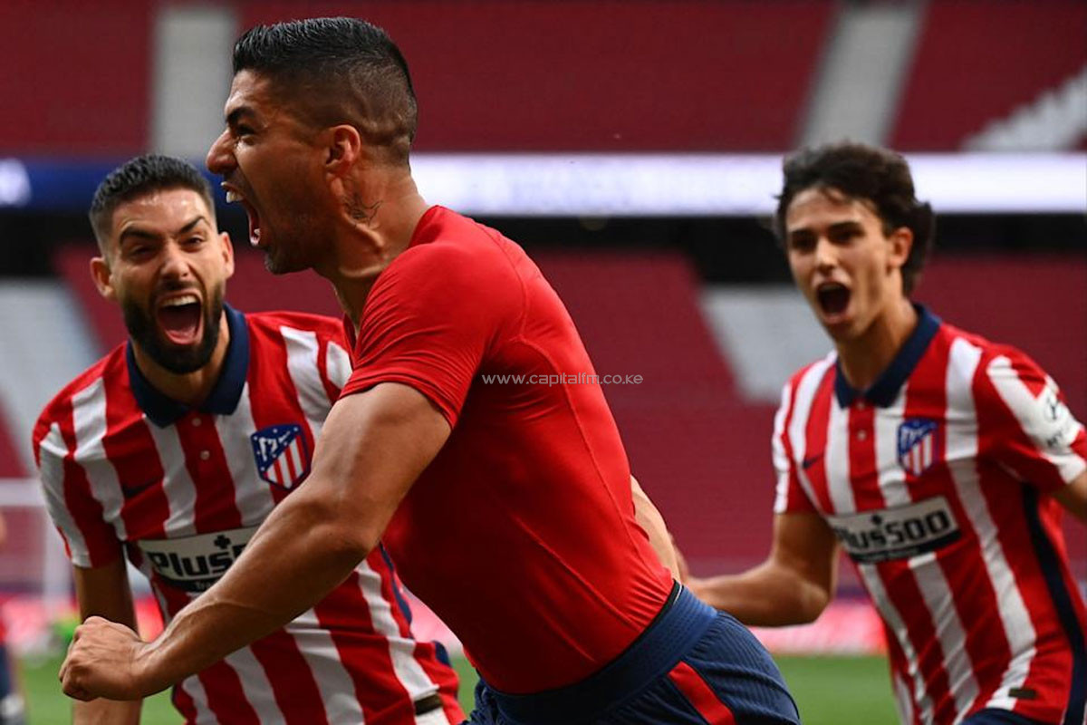 Suarez delivers La Liga title to Atletico Madrid