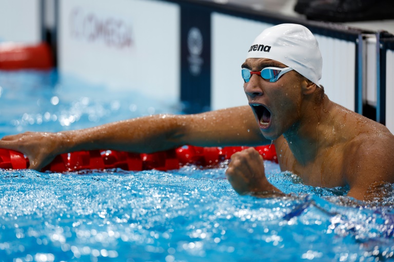 Japan celebrates gold rush on day of upsets at Olympics