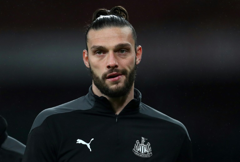 Ex-England striker Carroll due in court after arrest