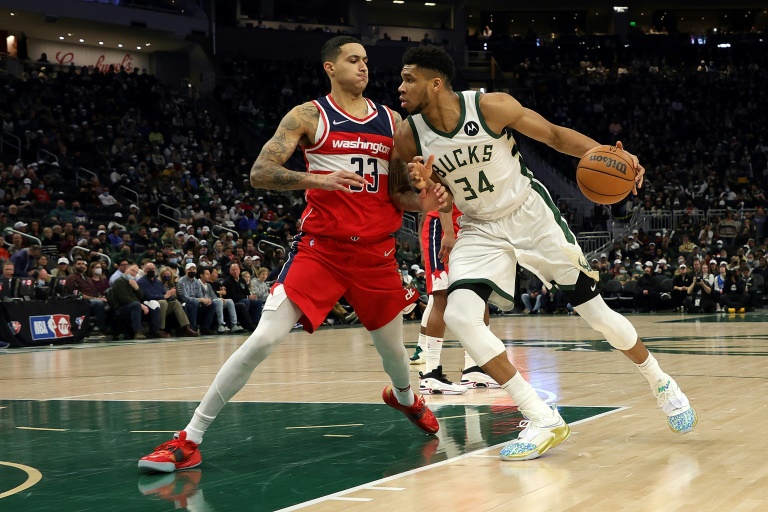Giannis’ triple double helps topple struggling Wizards