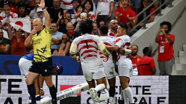 Japan players celebrate after their victory over Samoa. PHOTO/Rugby World Cup Website