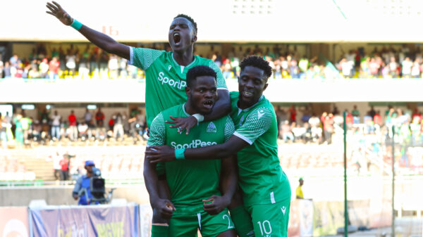 Gor Mahia's Benson Omalla is joined in celebrating his goal by Rodgers Mugisha and Austin odhiambo uring the Mashemeji Derby. PHOTO/Timothy Olobulu