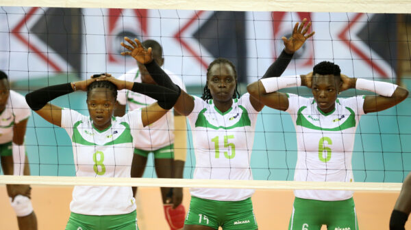 KCB's Esther Mutinda, Mercy Moim and Belinda Barasa prepare for a block. photo/Raymond Makhaya