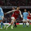 Gabriel Martinelli celebrates his winner against Manchester City