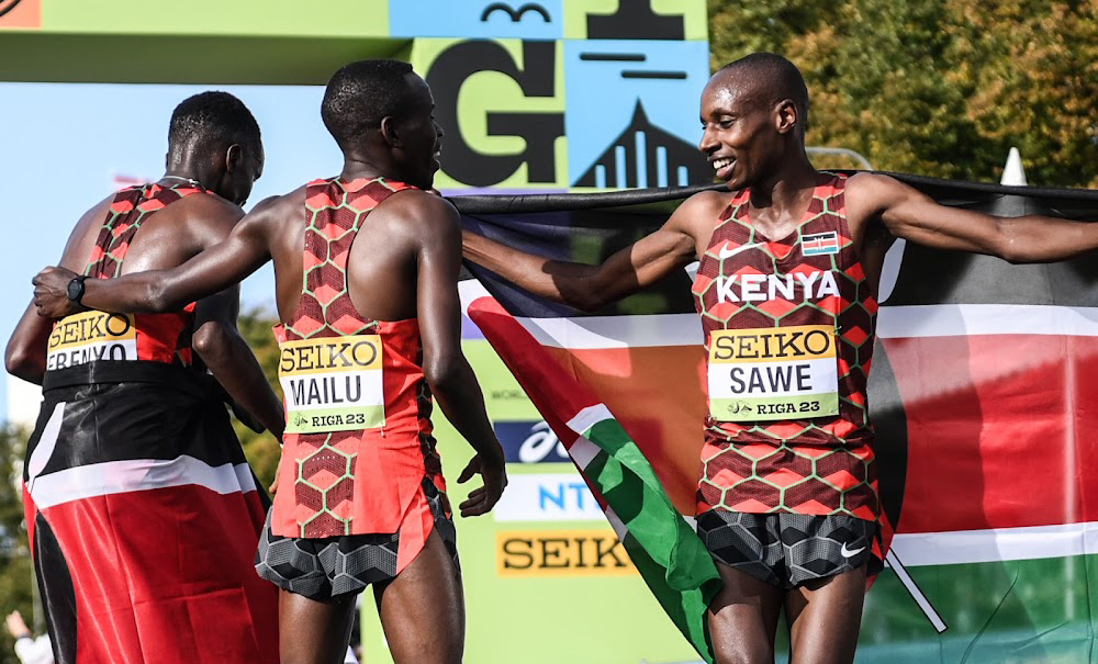 The Kenyan trio after sweeping the medals at the World Road Running Championships