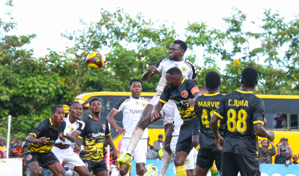 Tusker FC striker Deogratious Ojok rises for a header against Murang'a Seal. PHOTO/Timothy Olobulu