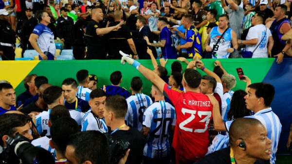 Emiliano Martinez attempts to stop police from beating fans. PHOTO/Sky